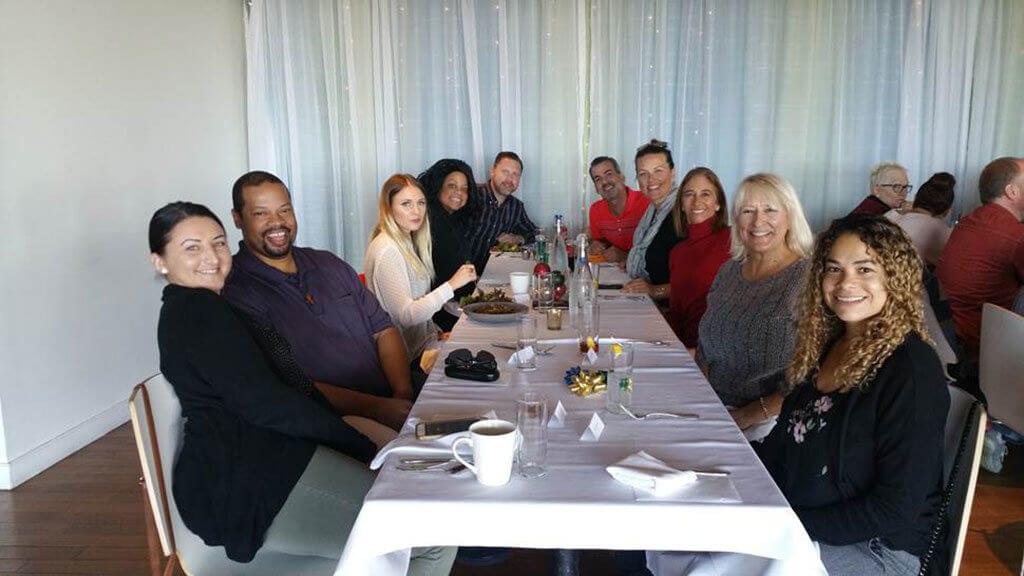 A few Community Managers and the Executive Team excited for dessert at our End of the Year Appreciation Luncheon at JRDN in Pacific Beach, CA.